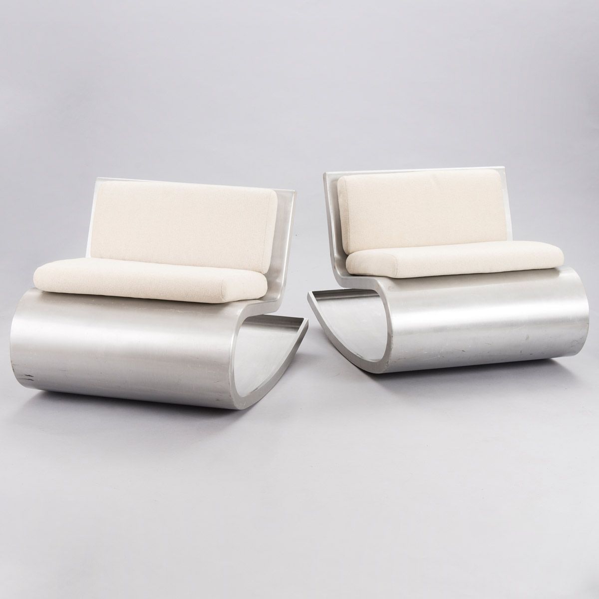 Aluminum chairs with cushions by Petra Majantie ja Siri Viherheimo.